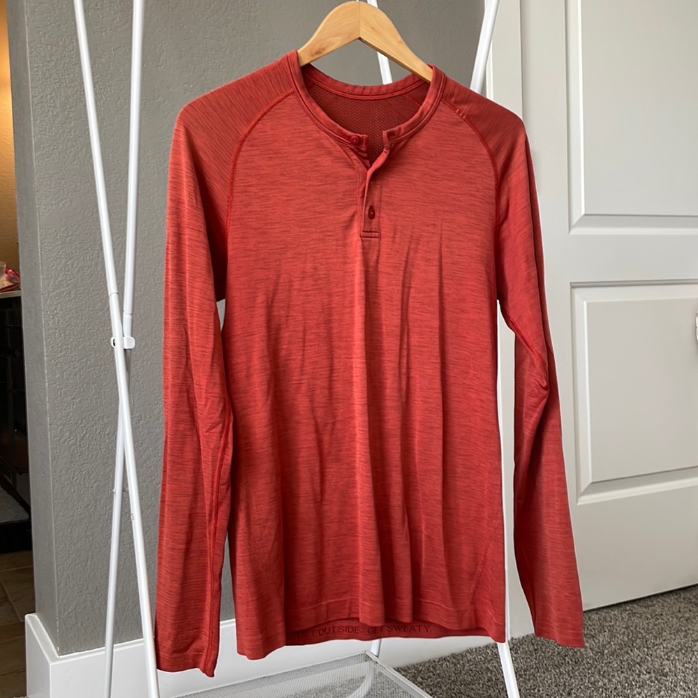 Lululemon long sleeve tee with button front.